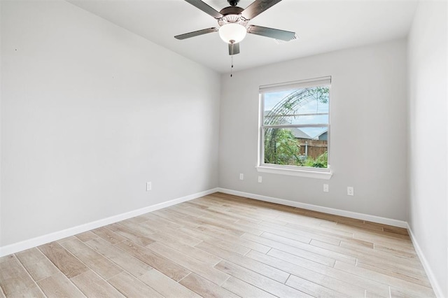 9233 NW 91st St, Yukon, OK 73099 - spare room with light wood finished floors and ceiling fan
