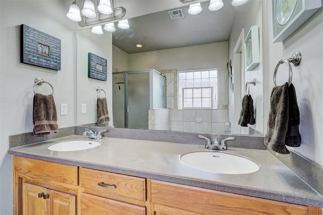 2209 Cedar Pointe Ct, Edmond, OK 73003 - bathroom featuring a shower stall and double vanity