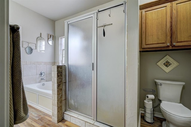2209 Cedar Pointe Ct, Edmond, OK 73003 - full bathroom featuring wood finished floors, a stall shower, and a bath