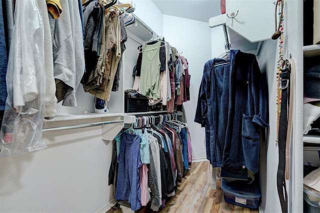 2209 Cedar Pointe Ct, Edmond, OK 73003 - spacious closet featuring wood finished floors