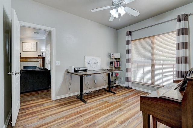 2209 Cedar Pointe Ct, Edmond, OK 73003 - office space with wood finished floors, a ceiling fan, and ornamental molding
