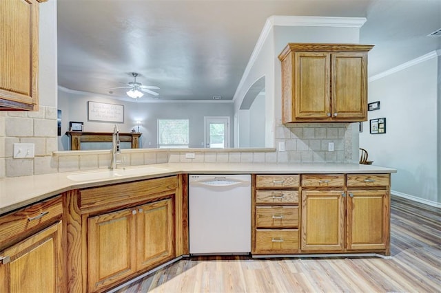 2209 Cedar Pointe Ct, Edmond, OK 73003 - kitchen featuring white dishwasher, tasteful backsplash, crown molding, light wood-style flooring, and ceiling fan