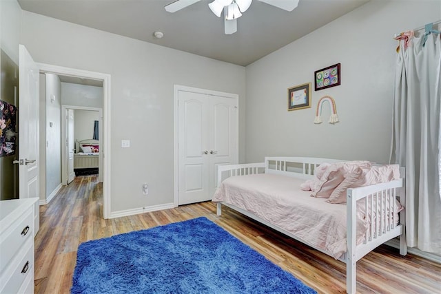 2209 Cedar Pointe Ct, Edmond, OK 73003 - bedroom with light wood-type flooring and ceiling fan