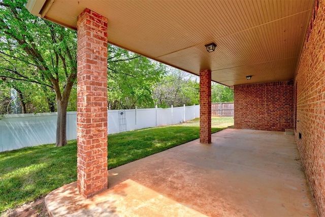2209 Cedar Pointe Ct, Edmond, OK 73003 - fenced backyard with a patio area