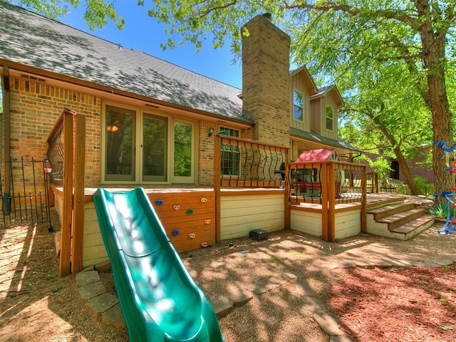 402 Hunters Ct, Edmond, OK 73034 - view of playground featuring a deck