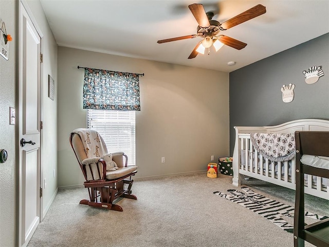 402 Hunters Ct, Edmond, OK 73034 - carpeted bedroom featuring a crib and ceiling fan