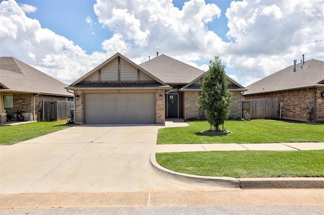 4004 Brougham Way, Oklahoma City, OK 73179 - view of front of house with an attached garage, concrete driveway, and brick siding