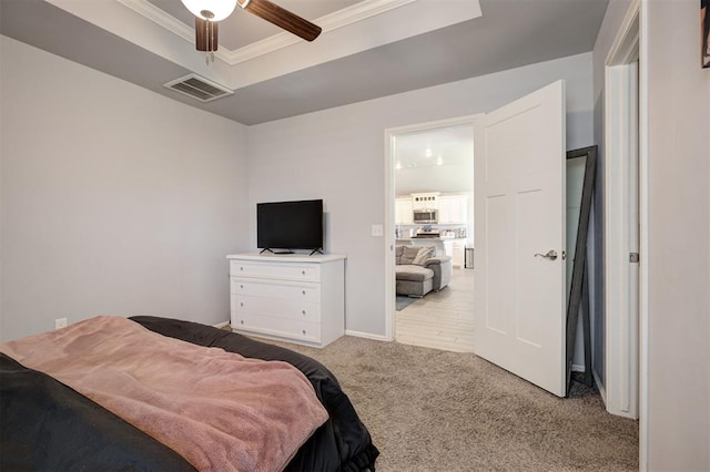4004 Brougham Way, Oklahoma City, OK 73179 - bedroom with crown molding, carpet, and a ceiling fan