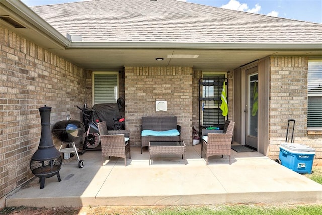 4004 Brougham Way, Oklahoma City, OK 73179 - view of patio featuring an outdoor living space