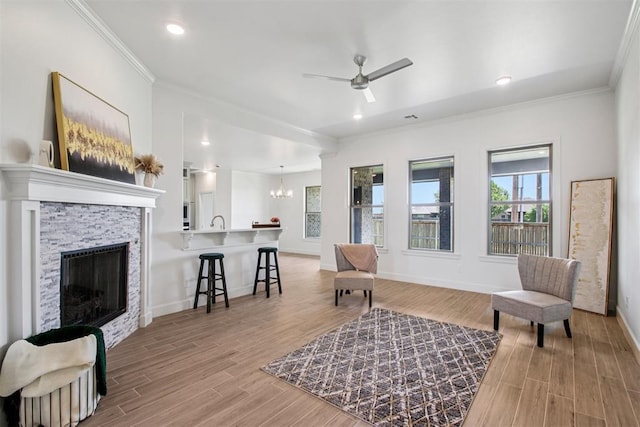 4204 Chesterfield Pl, Oklahoma City, OK 73179 - living area with a chandelier, ornamental molding, ceiling fan, light wood-type flooring, and recessed lighting