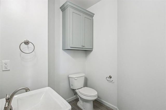 4204 Chesterfield Pl, Oklahoma City, OK 73179 - bathroom featuring baseboards and wood finished floors
