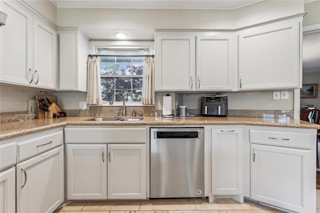 kitchen featuring dishwasher, white cabinetry, and crown molding