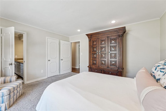 bedroom featuring carpet flooring, crown molding, recessed lighting, and ensuite bath