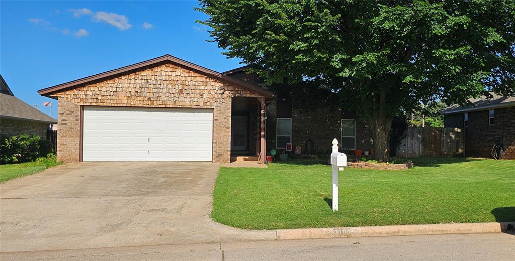 3104 Del Rey Dr, Midwest City, OK 73110 - single story home featuring driveway, an attached garage, and brick siding