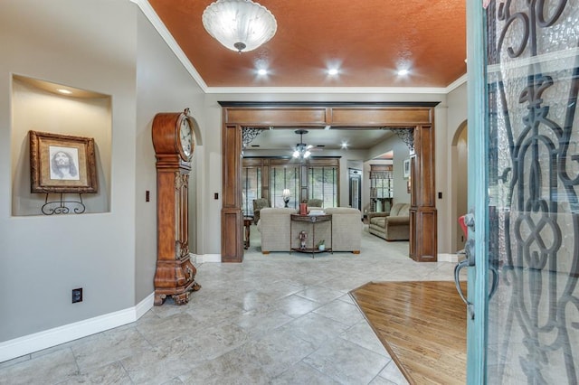 405 Kingsgate Rd, Yukon, OK 73099 - foyer with arched walkways, crown molding, and ceiling fan