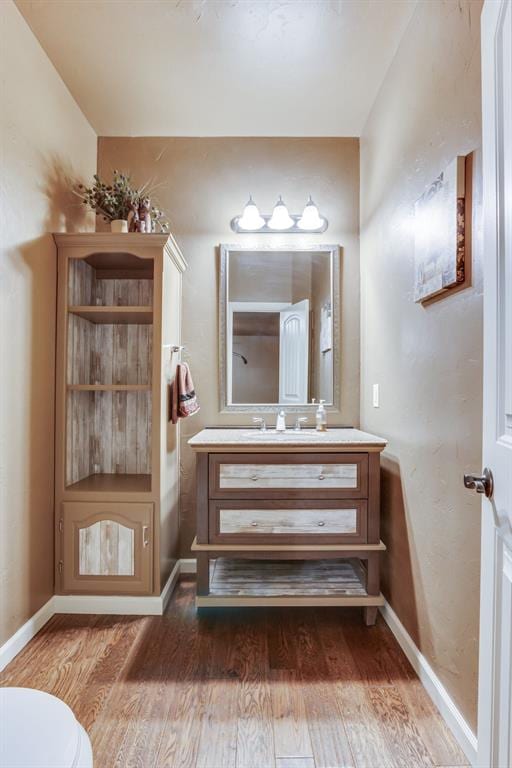 405 Kingsgate Rd, Yukon, OK 73099 - bathroom with wood finished floors and vanity