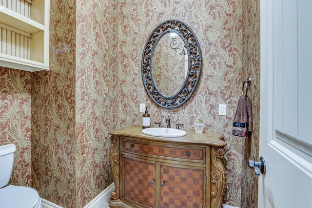 405 Kingsgate Rd, Yukon, OK 73099 - bathroom with wallpapered walls and vanity