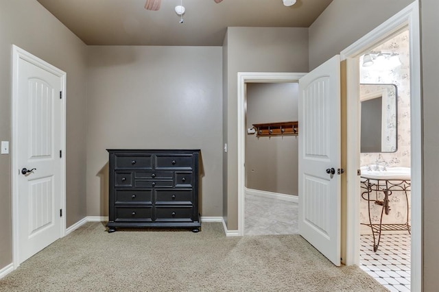 405 Kingsgate Rd, Yukon, OK 73099 - unfurnished bedroom featuring carpet flooring, a spacious closet, ensuite bathroom, ceiling fan, and a closet