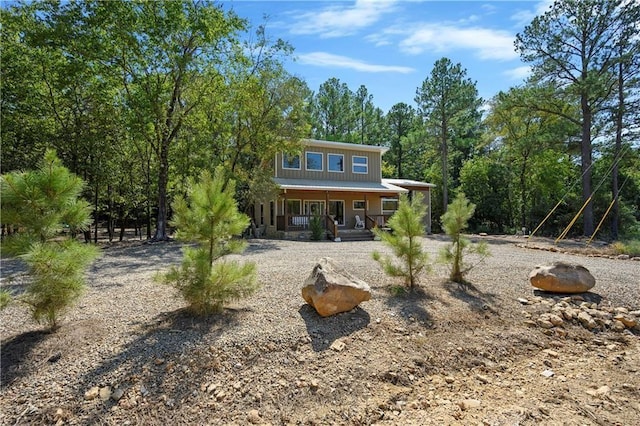 944 Camp Ranch Rd, Broken Bow, OK 74728 - rear view of property featuring covered porch