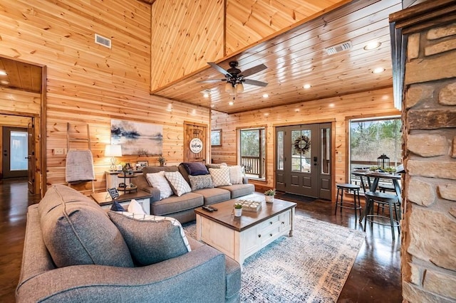 944 Camp Ranch Rd, Broken Bow, OK 74728 - living room featuring wood walls, recessed lighting, ceiling fan, a towering ceiling, and wood finished floors