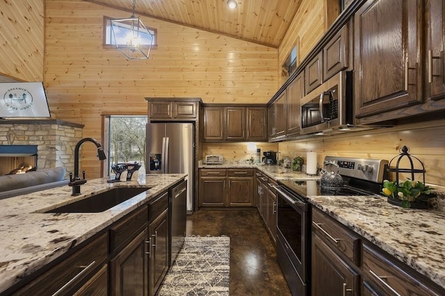 944 Camp Ranch Rd, Broken Bow, OK 74728 - kitchen with appliances with stainless steel finishes, wooden ceiling, wooden walls, dark brown cabinets, and finished concrete flooring