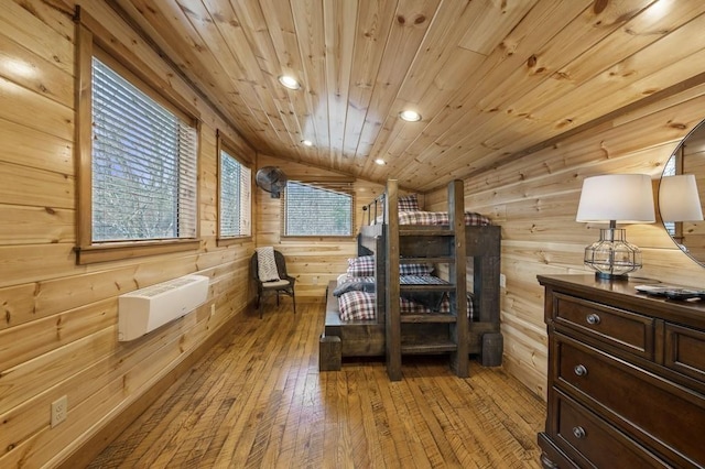 944 Camp Ranch Rd, Broken Bow, OK 74728 - bedroom with wood walls, light wood-style flooring, recessed lighting, wooden ceiling, and heating unit