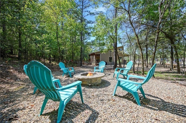944 Camp Ranch Rd, Broken Bow, OK 74728 - view of patio / terrace with an outdoor fire pit