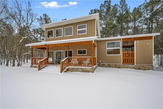 944 Camp Ranch Rd, Broken Bow, OK 74728 - view of front facade with board and batten siding