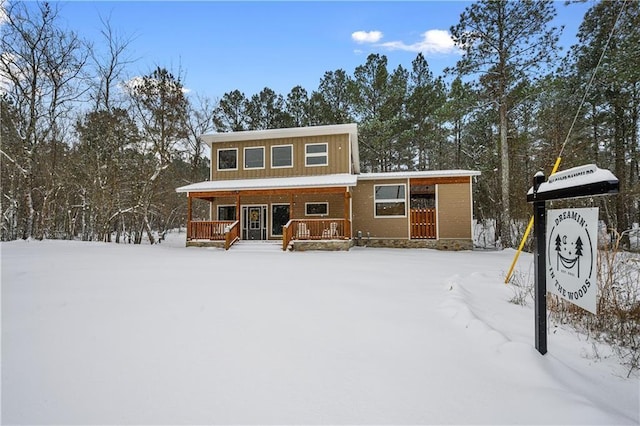 944 Camp Ranch Rd, Broken Bow, OK 74728 - rustic home with a porch