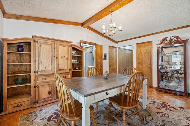 2408 Shady Tree Ln, Edmond, OK 73013 - dining room with a textured ceiling, a chandelier, and crown molding