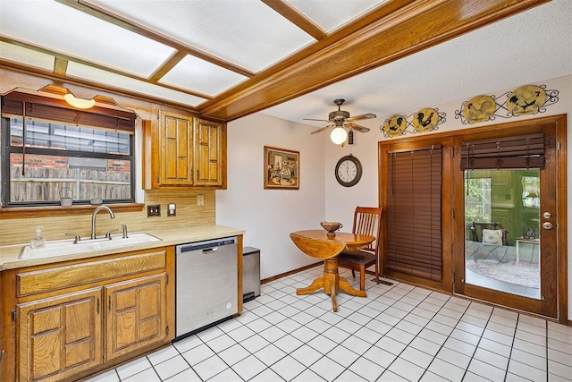 2408 Shady Tree Ln, Edmond, OK 73013 - kitchen with dishwasher, healthy amount of natural light, and light countertops