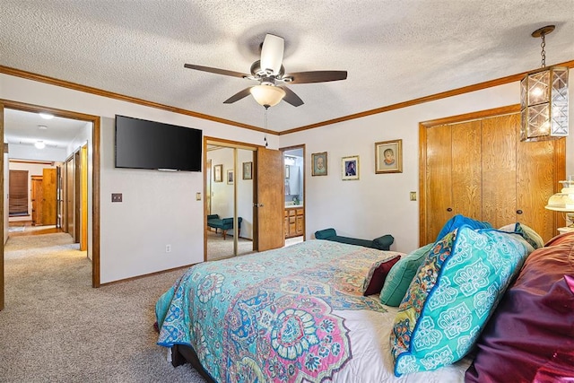 2408 Shady Tree Ln, Edmond, OK 73013 - carpeted bedroom with a closet, ornamental molding, a textured ceiling, and a ceiling fan
