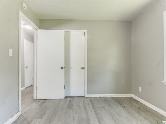 3320 NE 14th St, Oklahoma City, OK 73117 - unfurnished bedroom featuring wood finished floors