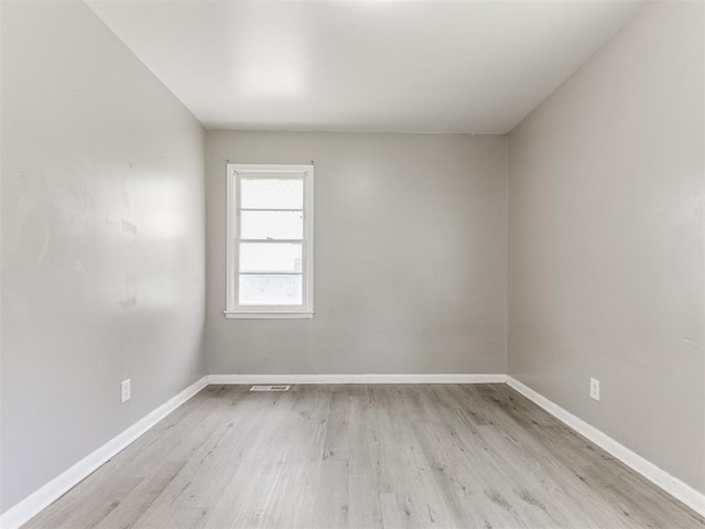 3320 NE 14th St, Oklahoma City, OK 73117 - unfurnished room with light wood-type flooring and baseboards