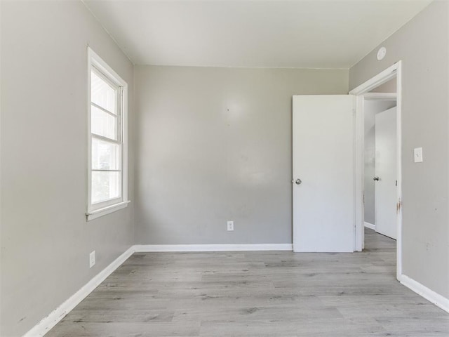 3320 NE 14th St, Oklahoma City, OK 73117 - unfurnished room with wood finished floors and baseboards