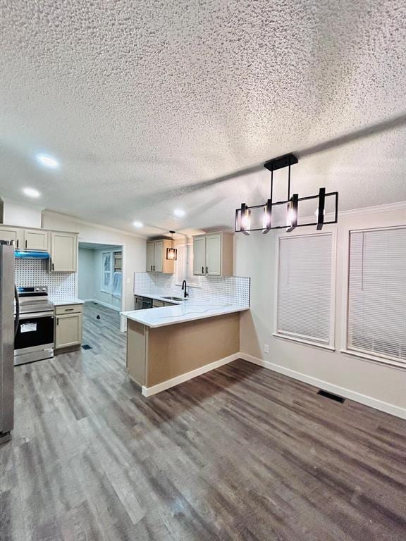 13001 Fox Pass Rd, Edmond, OK 73034 - kitchen with stainless steel appliances, a textured ceiling, dark wood-type flooring, backsplash, and recessed lighting