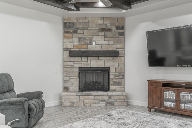 8908 NW 130th St, Oklahoma City, OK 73142 - living area with a fireplace, wood finished floors, and ceiling fan