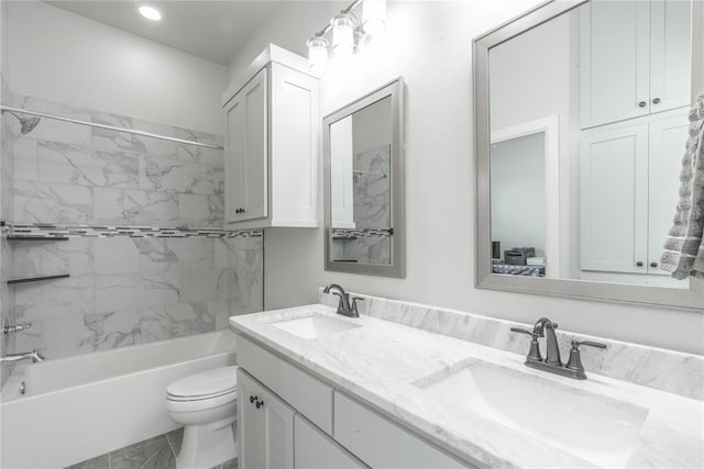8908 NW 130th St, Oklahoma City, OK 73142 - bathroom featuring double vanity, shower / washtub combination, and recessed lighting