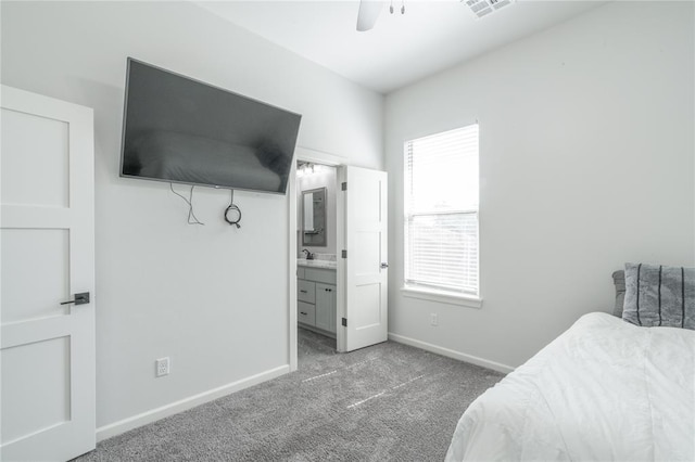 8908 NW 130th St, Oklahoma City, OK 73142 - bedroom with carpet, ensuite bathroom, and ceiling fan
