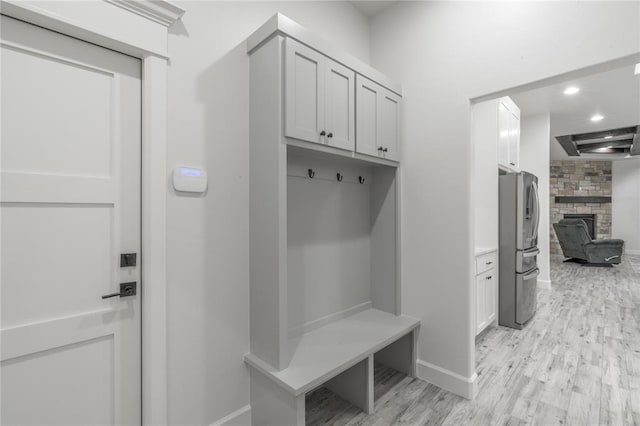 8908 NW 130th St, Oklahoma City, OK 73142 - mudroom with light wood-style floors and recessed lighting
