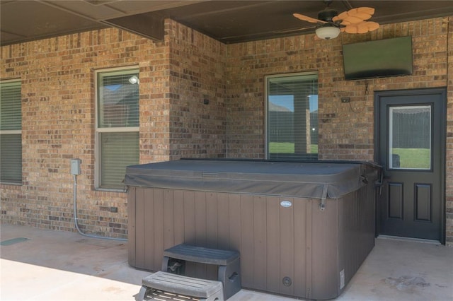 8908 NW 130th St, Oklahoma City, OK 73142 - view of patio / terrace featuring a hot tub and a ceiling fan