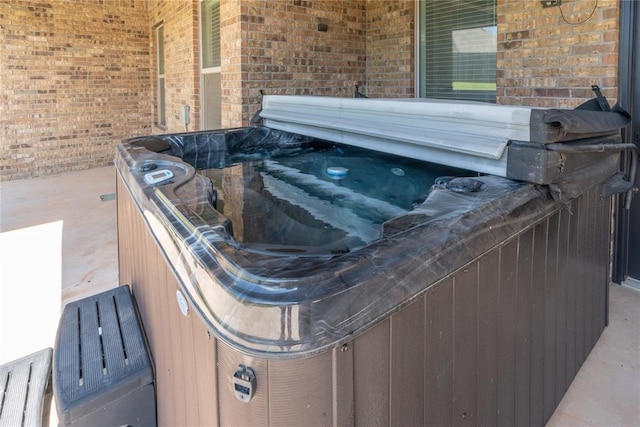8908 NW 130th St, Oklahoma City, OK 73142 - exterior view of a jacuzzi and brick siding