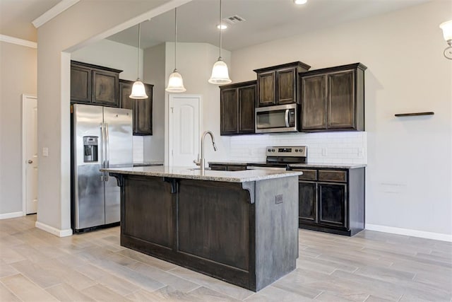 4213 NW 155th St, Edmond, OK 73013 - kitchen featuring stainless steel appliances, light stone counters, dark brown cabinets, backsplash, and crown molding