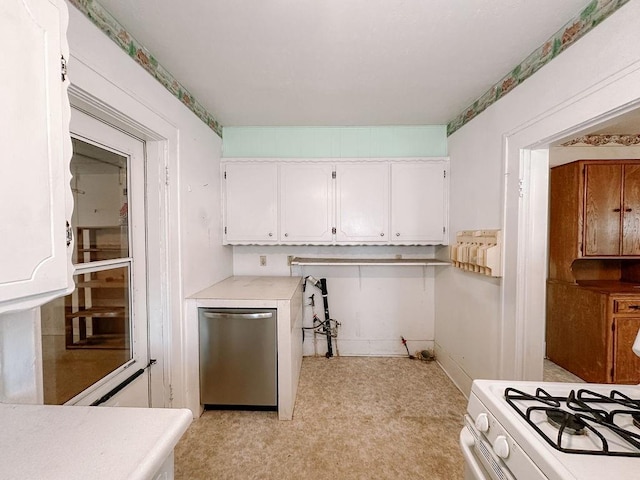 309 N Spencer Ave, Hinton, OK 73047 - kitchen featuring white gas range oven, white cabinets, dishwasher, and light countertops