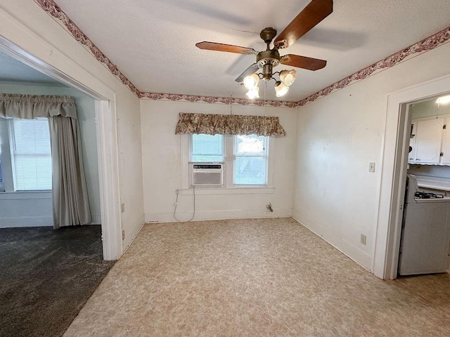 309 N Spencer Ave, Hinton, OK 73047 - carpeted spare room with cooling unit, ceiling fan, and a textured ceiling