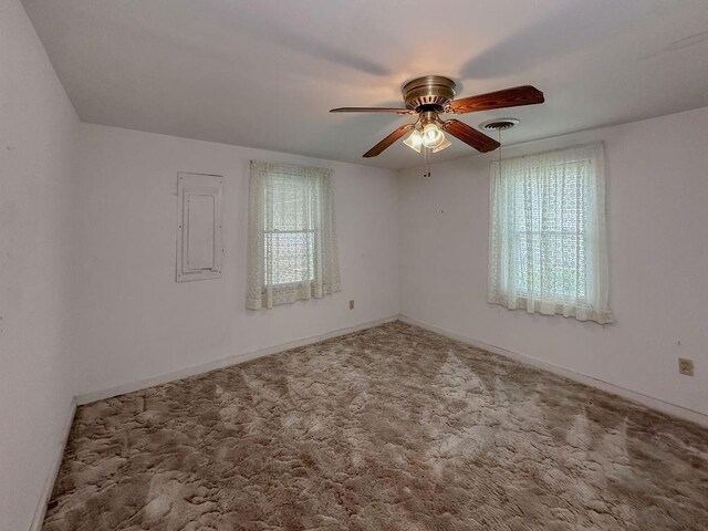 309 N Spencer Ave, Hinton, OK 73047 - carpeted empty room with healthy amount of natural light and ceiling fan