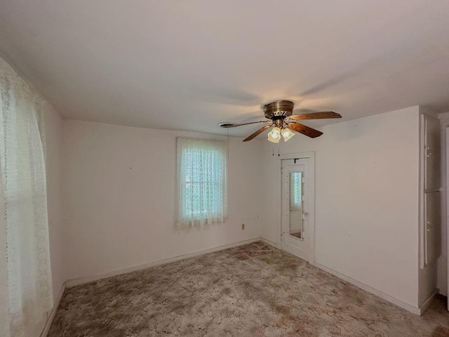 309 N Spencer Ave, Hinton, OK 73047 - empty room featuring a ceiling fan and light carpet