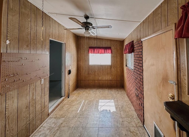 309 N Spencer Ave, Hinton, OK 73047 - empty room with wooden walls and ceiling fan