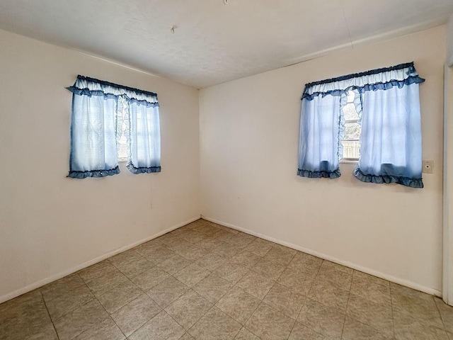 309 N Spencer Ave, Hinton, OK 73047 - spare room with healthy amount of natural light