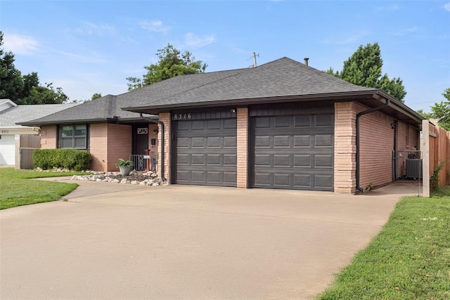 8316 NW 39th St, Bethany, OK 73008 - ranch-style home featuring brick siding, a garage, concrete driveway, and roof with shingles